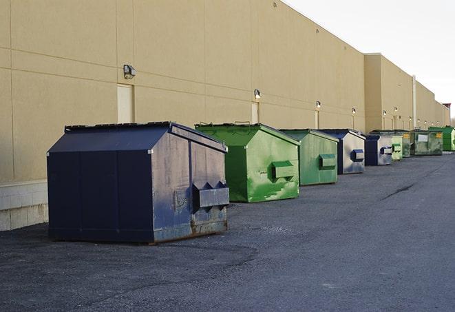 large construction dumpster positioned on a city street in Copeland KS